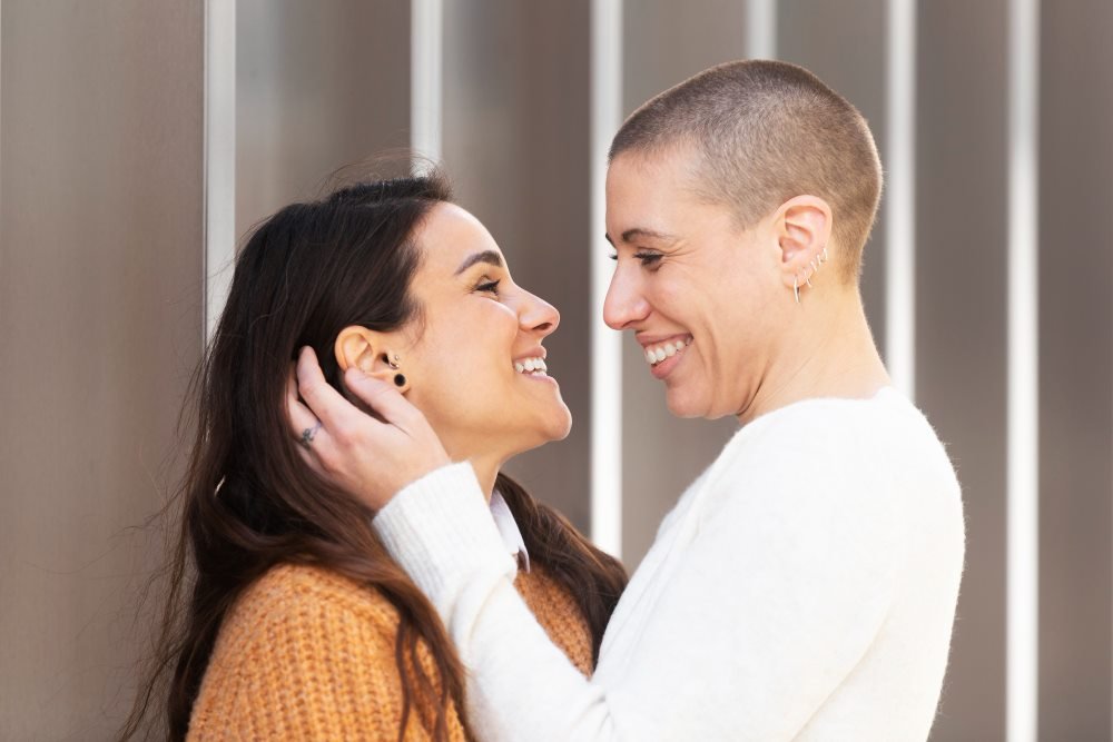 A smiling couple enjoying a close moment